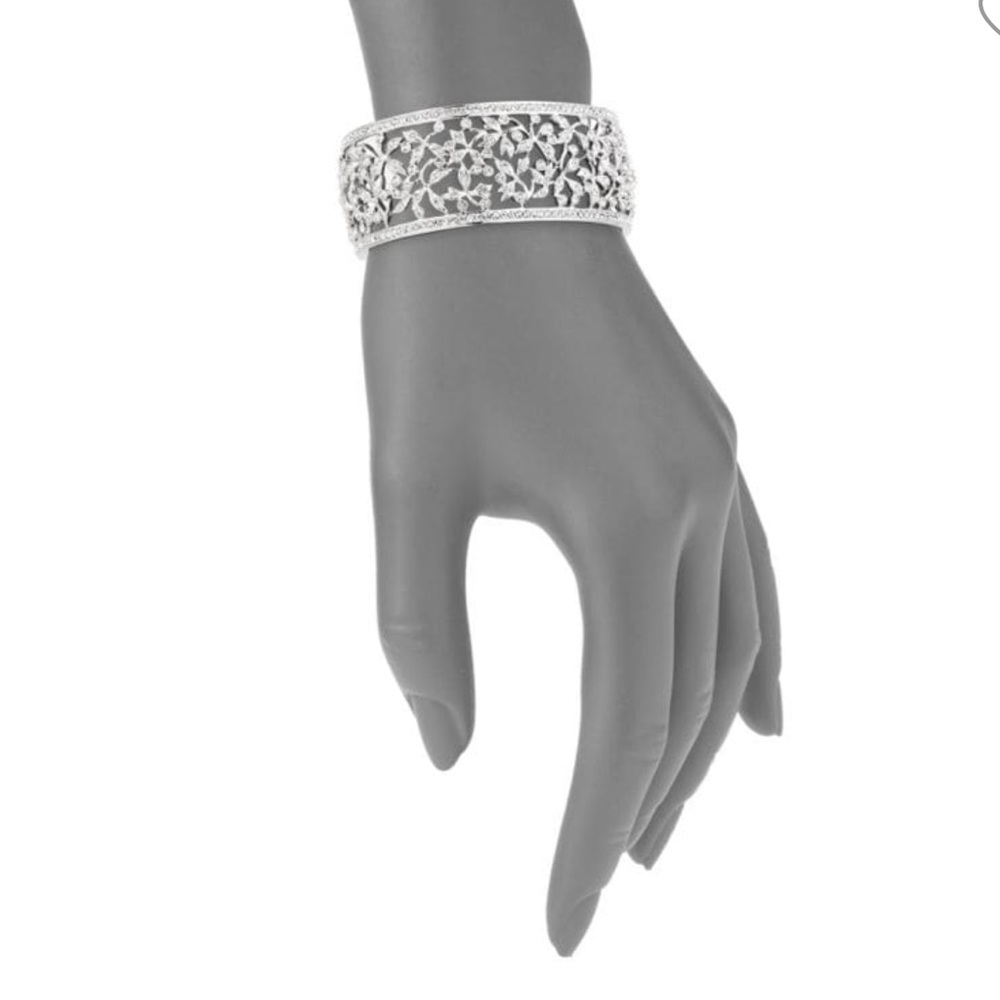 Intricate Silver Cuff Bracelet with Floral Design